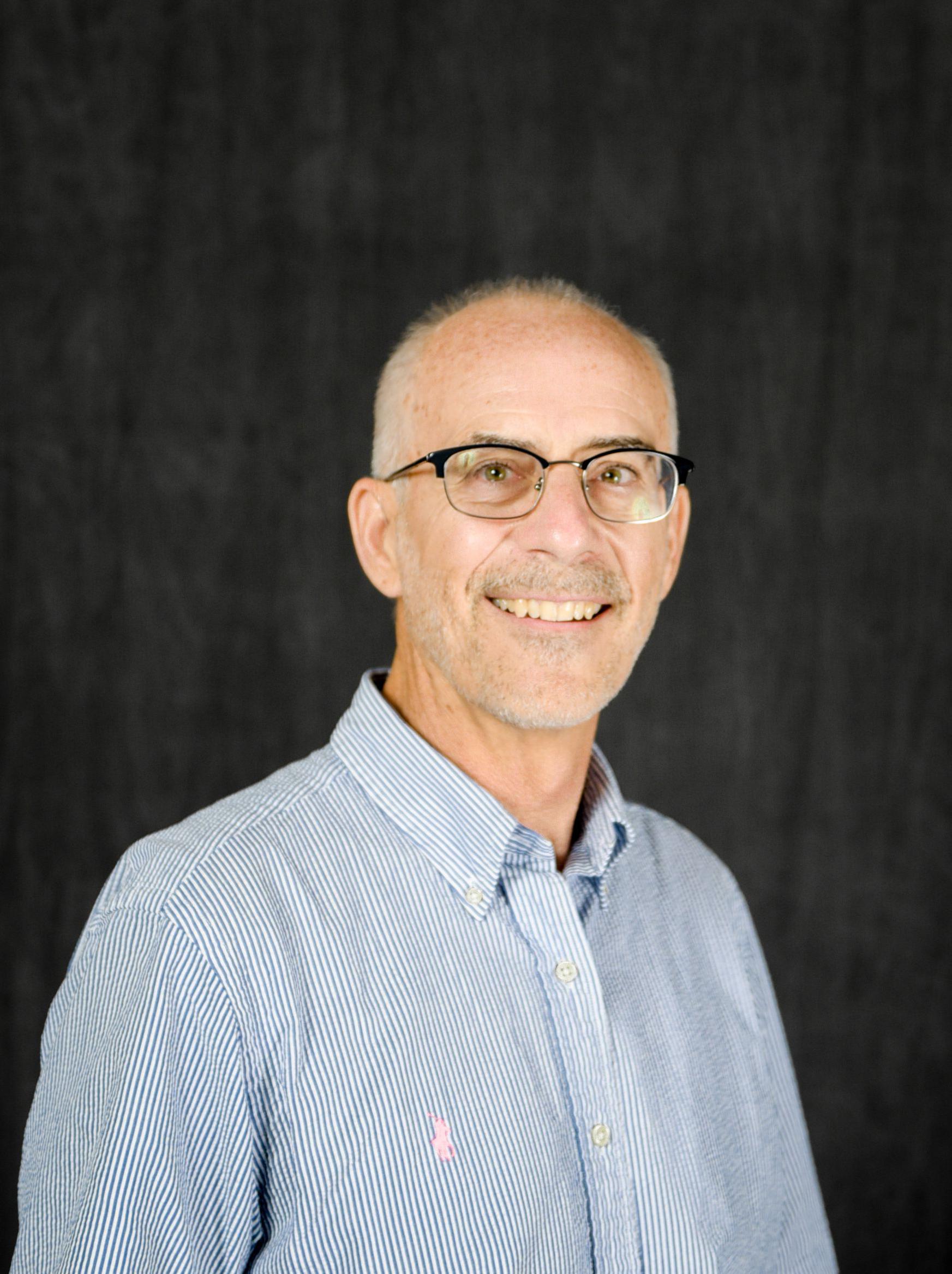 A man posing for a headshot